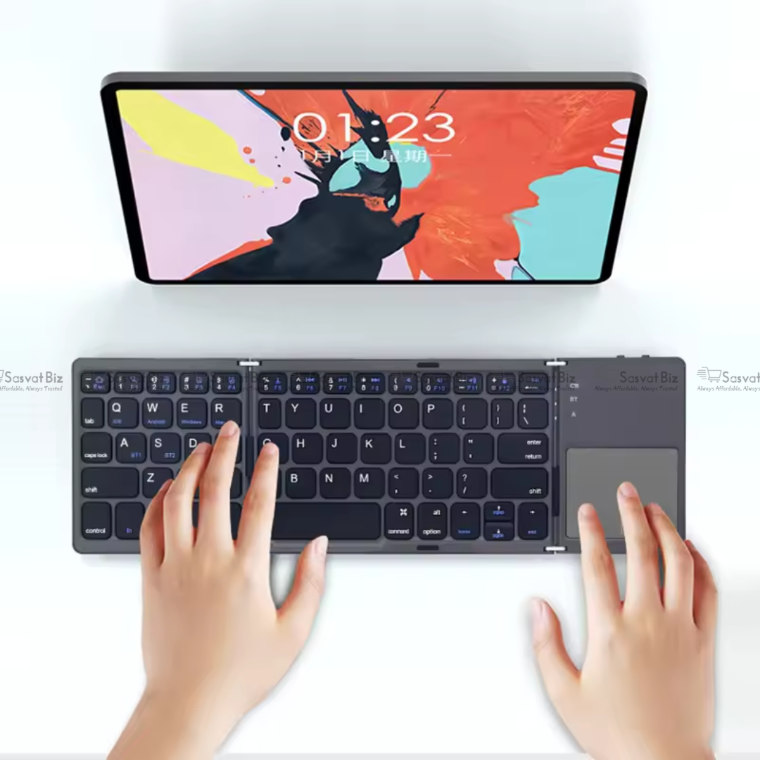 Foldable Bluetooth tri-fold wireless keyboard with touchpad and foldable laptop stand, portable design for travel and remote work.