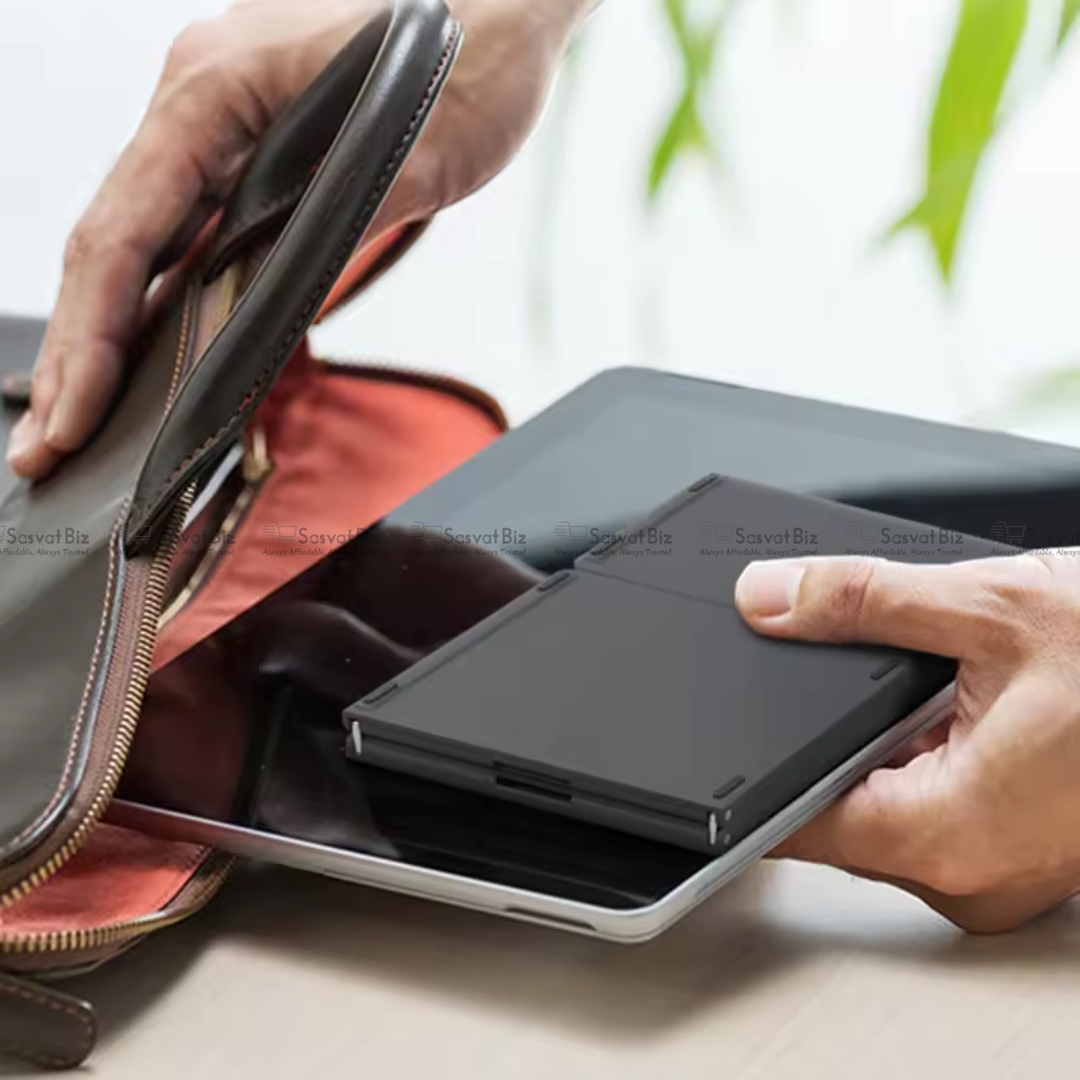 Foldable Bluetooth tri-fold wireless keyboard with touchpad and foldable laptop stand, portable design for travel and remote work.